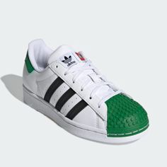 Adidas Youth Lego X Superstar J 'White Green' H03957 Leather Sneakers Size 4 - 6 Available Shoes Are Brand New And Have Never Been Worn. Shoes Do Come With Their Original Box. Slip-on Sneakers With Rubber Toe Cap For Sports, Slip-on Sports Sneakers With Rubber Toe Cap, Adidas White Sneakers With Rubber Toe Cap, Sports Skate Shoes With Rubber Toe Cap, Green Sneakers With Rubber Toe Cap For Sports, Sporty Low-top Custom Sneakers With Rubber Toe Cap, Sporty Custom Sneakers With Rubber Toe Cap, Adidas White Skate Shoes With Rubber Waffle Outsoles, Adidas Sneakers With Rubber Toe Cap For Sports