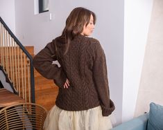 "MATERIAL : 2 strands of 100 % alpaca yarn COLOUR : Brown ( There may be a slight difference because of the different monitors' representation) ♥ In the picture the model is wearing a garment with these measurements : A: ( Body Length) : 30 \" / 76 cm B: (Chest width) : 19.7 \" / 50 cm C : (Sleeve from armpit) : 24 \" / 61 cm D: (Neck unrolled) : They are taken with the item laid flat and not streched. ♥ For choosing your size please look at size chart in our listing pictures. Please check caref Fall Mohair Cable Knit Sweater, Brown Chunky Knit Crew Neck Outerwear, Hand Knitted Mohair Sweater For Fall, Chunky Knit Alpaca Knitting Pattern For Fall, Fall Chunky Knit Alpaca Knitting Pattern, Winter Brown Alpaca Sweater, Knitted Alpaca Sweater For Fall, Brown Mohair Knitted Sweater, Brown Merino Wool Cable Knit Sweater