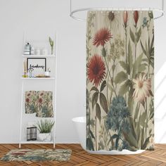 a shower curtain with flowers on it in a bathroom next to a bathtub and shelf