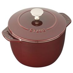 a red pot with the word stay on it and a white knob in the middle