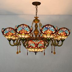 a stained glass chandelier hanging from the ceiling