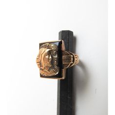 Vintage early 20th century 10K gold and black onyx ring, size 8.5.  Gold man and woman relief profile on black onyx, marked 10K inside band.  Overall light surface wear. Antique Black Enamel Rings For Collectors, Antique Black Enamel Collectible Rings, Antique Black Enamel Signet Ring, Black 14k Gold Hallmarked Engraved Ring, Antique Black Signet Ring Collectible, Victorian Black Engraved Ring In 14k Gold, Antique Black Engraved Ring With Polished Finish, Victorian Engraved Black Ring In 14k Gold, Victorian Black Signet Ring Stamped 14k