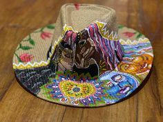 I add colors to anything you would like to wear. I work with customers individually and the whole process takes about 3-5 days. If you like what you see, reach out to me and we ll make your world brighter! ✨Beautiful Stylish hand painted hat/Sombrero ✨ Each Style is unique ✨Perfect for adding an extra special touch to your outfit. Also can be used as an art piece hanging on the wall.  ✨ - Medium Size- One Size fits most Handmade Multicolor Hats For Rodeo, Unique Handmade Fedora For The Beach, Unique Handmade Fedora For Beach, Custom Wide Brim Multicolor Hat, Custom Multicolor Wide Brim Hat, Custom Multicolor Brimmed Hat, Unique Multicolor Beach Hat, Custom Multicolor Flat Brim Hats, Custom Multicolor Hat With Curved Brim