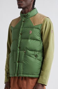 As the weather warms or cools, keep this down vest handy for its just-right core-warming capabilities and comfort-minded details like elasticized armholes. Front snap closure Stand collar Front snap patch pockets Side slits Lined, with down fill 100% polyamide with 100% cotton contrast Hand wash, dry flat Imported Designer Clothing Down Vest With Padded Collar, Sleeveless Down Vest With Padded Collar, Fitted Nylon Outdoor Vest, Functional Midweight Winter Vest, Fitted Outdoor Puffer Vest, Fitted Puffer Vest For Outdoor, Sleeveless Green Nylon Outerwear, Functional Winter Hiking Vest, Green Winter Vest For Outdoor Activities