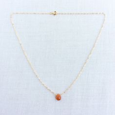 This is a Sunstone necklace made of genuine high quality faceted Madagascar Sunstone. There are gold filled ,sterling silver and 14kt gold chain you can choose from. This dainty choker necklace glares with rainbow color. This Sunstone jewelry is light weight and elegant. This Sunstone is around 1.35 carats in the tear drop shape. This delicate choker is great for layering with other gold and stone necklaces. Measurement: 9 mm by 7 mm S for Sparkle on Etsy https://www.etsy.com/shop/sforsparklesho Amber Birthstone Dainty Necklace, Sunstone Gemstone Necklace For Gift, Sunstone Gemstone Necklace As A Gift, Sunstone Gemstone Jewelry As Gift, Minimalist Amber Necklaces With Gemstone, Dainty Carnelian Gemstone Jewelry, Dainty Faceted 14k Gold Filled Necklaces, Dainty 14k Gold-filled Faceted Necklace, Dainty 14k Gold Filled Faceted Necklace