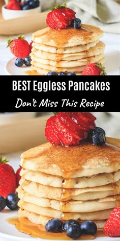 pancakes are stacked on top of each other with strawberries and blueberries on top