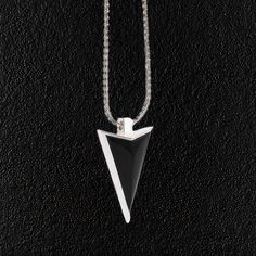 Sterling Silver Arrow Pendant Sterling Silver Necklace With Black Enamel, Modern Silver Necklace With Black Enamel, Sterling Silver Pendant Necklace With Black Enamel, Modern Black Necklace With Large Pendant, Modern Black Enamel Pendant Necklace, Silver Onyx Necklace With Polished Finish, Silver Sterling Silver Arrowhead Necklace, Black Minimalist Necklace With Large Pendant, Minimalist Black Necklace With Large Pendant