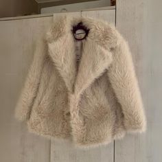 🌟 Luxury Fur Coat! Stay Stylish & Cozy 🦄🌈 Indulge in cloud-like comfort with this plush winter coat! 😌💤 🎁 Perfect Pampering Gift: Ultimate coziness in this stylish piece! 🎀🎁 Treat yourself or surprise a loved one with this cozy, smile-inducing plush jacket. 😍🎉 Specifications: Color: Brown / Beige (any other colors can be requested via message)  Materials: Vegan Fur + Cotton Size Guide (cm): Size| Shoulder | Bust | Length | Sleeve Length  XS-------55--------104------70-----------51----- Cute Long Sleeve Beige Outerwear, Cute Beige Long Sleeve Outerwear, Cute Cream Outerwear, Cute Cream Long Sleeve Outerwear, Winter White Fluffy Long Sleeve Outerwear, Cute Cream Winter Outerwear, Fluffy Beige Outerwear For Cold Weather, Beige Fluffy Outerwear For Cold Weather, Fluffy Long Sleeve Cozy Fur Coat