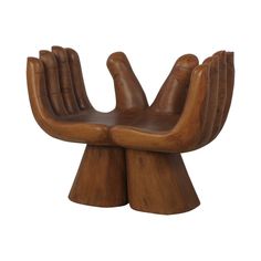 a wooden chair that has two hands on it's back and one hand extended out to the side