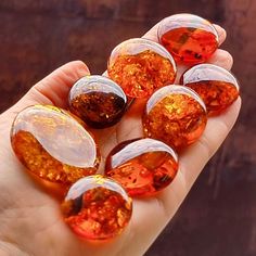 High Quality Baltic amber cabochons for jewelry making. Various sizes, flat bottom cabochons, All products are handmade with passion. Everyday we do our best to fullfil each customer needs.  D E T A I L S *Genuine Baltic amber *Free shape  *Cognac color *The price given per unit *Provide free drilling * Square size in picture equals 1x1cm  (0,39-0,39 inches) Some pictures can be slightly different from the actual color of gemstones. *Amber is powerful healer and cleanser of the body and spirit. Round Amber Beads Gems And Cabochons For Gifts, Amber Beads And Cabochons For Gift, Round Amber Beads, Gems, And Cabochons For Gifts, Round Amber Beads And Cabochons For Gifts, Amber Beads For Jewelry Making, Releasing Negative Energy, Free Shapes, Natural Antibiotics, Cognac Color