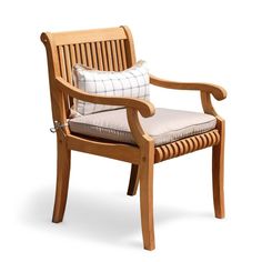 a wooden chair with a pillow on it's back and seat cushion in the middle