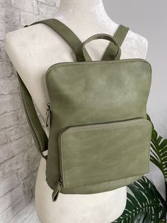 The perfect mini backpack that is great for everyday use! The perfect substitute for a classic purse without being too big and bulky! Holds all the essentials while still being stylish! All of the Julia style backpacks have the same green filigree pattern lining on the inside! 11″ high x 11″ wide x 4″ deep with a taper inward at the top. Zip top closure. Adjustable straps: 19"-35". Front zip closure pocket: 8" wide x 5.5" high. Three credit card slots inside front pocket. Hidden zip closure pock Classic Purse, Filigree Pattern, Mini Backpack, Zip Top, Front Pocket, Fashion Backpack, Card Slots, Slots, Adjustable Straps