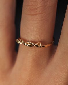 A thick, sleek and durable barbwire inspired ring. Add a unique twist to your stack! This listing is for ONE SINGLE Barbed Wire Ring in 14K GOLD FILL. To create the Barbed Wire Ring, we wrap metal wire in to a twisted shape. This ring is a great alternative to a simple band and pairs perfectly with other stacking rings. These make perfect bridesmaid or friendship rings! Every piece is organic and unique — no two Hannah Naomi pieces are exactly alike.Hand-crafted to order in our Portland, OR studio. Minimalist Twisted Yellow Gold Ring, Modern Twist Twisted Promise Ring, Modern Twisted Shape Promise Ring, Modern Twisted Promise Ring, Twisted 14k Gold Rings With Modern Twist, Minimalist Twisted Gold Rings, Modern Twist 14k Gold Twisted Ring, 14k Gold Twisted Rings For Gift, Twisted 14k Yellow Gold Stackable Rings