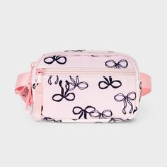 Girls' Bow Print Crossbody Bag - Cat & Jack™ Pink Trendy Rectangular School Belt Bag, Trendy Pouch Belt Bag For School, Trendy Belt Bag With Removable Pouch For School, Adjustable Pink School Bag, Trendy Pink Belt Bag For Travel, Trendy Pink Belt Bag With Removable Pouch, Trendy White Belt Bag For School, Pink School Bags With Cell Phone Pocket, Trendy Adjustable Bags For Back To School