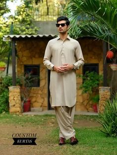 Welcome My Shop:  COUSTOMKURTAS. Beige Kameez Shalwar Men Pakistan Indian Collection, Simple and Decent, Classic 2 piece Shalwar Kameez, Premium fabric, Beige Shalwar Kameez - **Fabric Cotton - Pure - **Style Beige - **Color show  the picture (More colors available, please check) These Men's Kurta shirts can be customized as per your requirement. **Example For a 34-inch actual body chest size, we add loose fitting fabric armhole to armhole with 6 inches extra, making the total ready kurta size 4 Men's Kurta, Shalwar Kameez, Sport Coat, Beige Color, Color Show, Pakistan, Beauty Book, I Shop, Loose Fitting