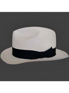 Brand: Gamboa PremiumColor: Natural Material: Toquilla Straw Brim: 8 cm. (3 1/10")Grade: 40 (Museum Select)learn more Sweatband: Cotton Twill, 3 cm. (1.18") Crown: 11 cm. (4 3/10") Ribbon: Linen Description: With the highest grade of straw weaving attainable, this luxurious hat is an absolute work of art. It is handmade in Montecristi, the worldwide famous Panama Hat town in Ecuador. This Panama Fedora hat, classic and elegant will be yours for a lifetime. Each hat is individually hand blocked a White Adjustable Panama Hat For Formal Occasions, White Brimmed Panama Hat For Formal Occasions, White Flat Brim Fedora For Formal Occasions, White Formal Panama Hat, White Formal Panama Hat With Short Brim, Classic White Hat Bands For Formal Events, Fitted White Fedora For Formal Occasions, Formal Fitted White Fedora, White Panama Hat With Curved Brim For Formal Occasions