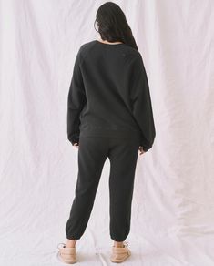 Inspired by a vintage athletic sweatpant, The Stadium Sweatpant. has an elasticated waist and legs with hidden drawstring. Pair back to tees and sweatshirts, or with a feminine blouse for an ironic look. 100% Cotton Machine Wash Cold Tumble Dry Low Made in the U.S.A. Feminine Blouses, Sweatpants, Sweatshirts, Black, Tracksuit Bottoms