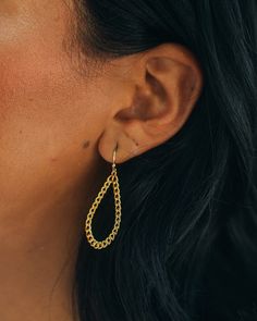 The Nikole Dangle Earrings have style dripping off of them! Show off your trendsetting side with the unique chain link detail and teardrop dangle. Get ready to make a fashion statement with these earrings - they'll ensure you shine brighter than the stars! Material: 14K gold or rhodium plated brass Features: 1.75" drop, 0.8" width, Lead & Nickel free, fish hook post Trendy Everyday Teardrop Earrings, Chic Metal Teardrop Dangle Earrings, Modern Chain Drop Earrings, Trendy Teardrop Hoop Earrings, Chic Metal Teardrop Drop Earrings, Minimalist Gold Chain Earrings, Chic Teardrop Metal Jewelry, Trendy Dangle Gold Chain Jewelry, Chic Drop Earrings With Gold Chain