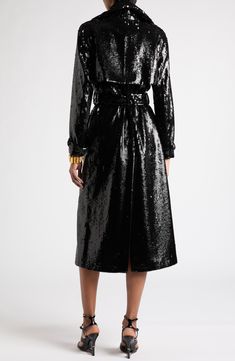 The label's knack for elevating wardrobe essentials into statement pieces is embodied in this trench coat encrusted all over with shimmering sequins. 47" length (size 36IT) Double-breasted button closure Notched collar Adjustable belted cuffs Front welt pockets Epaulets Gun flap Storm flap Removable belt Lined 100% wool Dry clean Made in Italy Designer Clothing Chic Sequined Outerwear For Evening, Chic Sequined Evening Outerwear, Luxury Long Sleeve Sequined Outerwear, Belted Long Coat For Party, Luxury Fall Party Outerwear, Belted Trench Coat, Notched Collar, Welt Pockets, Tom Ford