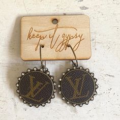 Included: one pair of earrings Sizing: 1.75 x 1.75 Authentic LV logo *Attention/ Disclosure: This product is an upcycled product made from legally purchased, used LV products. This product is not endorsed by LV and does not fall under any warranty by LV. Upcycled Product, Upcycled Lv, Lv Logo, New Home Decor, Chic Farmhouse, Designer Items, Christmas Items, Purse Charms, Full Circle