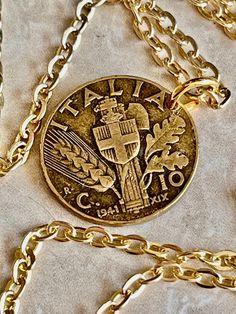 "This old Italy coin necklace is a unique and beautiful way to show your love for the country.  This is the perfect gift for anyone who loves Italy, or who wants to commemorate a special trip to the country. Old Italy Coin Necklace Italian 10 Lira Pendant Custom Made Vintage and Rare coins - Coin Enthusiast - Fashion Accessory Made in Canada   Choose Your Year.  ** Any of my Necklace Pendants can be made in a Keychain. Message me to request this necklace to be a Keychain for the same price. A small piece of a place you visited, or your home country. Looking for that special piece of jewelry that connects you to the past, look no further.  A small piece of history filled with memories from its travels around the world. Nice gift for a friend. And a great conversation starter.  Each coin has Italian Coin Necklace, Old Italian Jewelry, Old Italy, Custom Pendant Necklace, Show Me The Money, Historical Documents, Necklace Pendants, Custom Pendants, World Coins