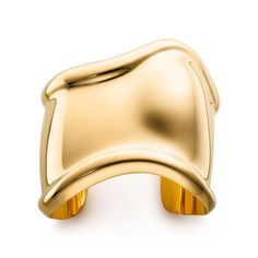 The sublime asymmetry and sensuous contours of Elsa Peretti® Bone cuffs have an ergonomic quality that makes them one with the body.This item can be personalized. For more information, call 800 843 3269. Note, engraved items ordered after 2/3 at 5:30PM EST will be delivered after Valentine's Day. 18k yellow gold; Design motif, medium; 61 mm wide; For the right wrist; Wrist size, extra small; Designed to be worn alone or as a pair; Original designs copyrighted by the Elsa and Nando Peretti Founda Bone Cuff, Jewelry Tiffany, Tiffany Bracelets, Stackable Bangles, Jewelry Bracelets Gold, Elsa Peretti, Arm Party, Gold Bracelet Cuff, Gold Cuffs