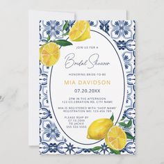 a blue and white floral bridal shower with lemons