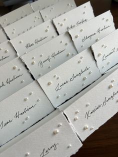 wedding place cards with pearls on them