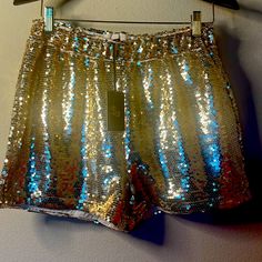 Very Generous Fitting, The Waist Stretched Is 18 Inches. Gold Bottoms For Summer Party, Spring Beach Gold Bottoms, Gold Stretch Summer Shorts, Gold Bottoms For Summer Night Out, Gold Bottoms For Night Out, Gold Bottoms For Night Out In Summer, Gold Sequined Bottoms For Summer, Glamorous Stretch Shorts For Summer, Gold Stretch Shorts For Night Out