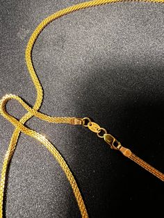 Embrace the allure of pure sophistication with our exquisite 22k gold chain, a versatile piece that transcends the ordinary. Designed for both him and her, this 22-inch masterpiece radiates with a warm glow, adding an understated luxury to any ensemble. Why Choose Our 22K Gold Chain? This chain isn't just an accessory; it's an investment. With its timeless appeal and solid gold composition, it promises to be a staple in your jewelry collection, withstanding the test of time and trends. Gold Snake Chain Necklace For Wedding, Gold Box Chain Necklace For Wedding, Gold Plated Wheat Chain Necklace For Formal Occasions, Elegant Gold Necklace With Wheat Chain, Formal Gold-plated Wheat Chain Necklace, Formal Gold Plated Wheat Chain Necklace, Luxury Gold Jewelry With Wheat Chain, Luxury Gold Wheat Chain Jewelry, 22k Gold Chain Necklace For Wedding