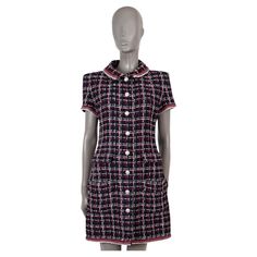 100% authentic Chanel short sleeve tweed shirt dress in navy blue, red and white viscose (50%), linen (22%), polyamide (17%) and cotton (11%). Features braided trims and four flap pockets at the waist. Opens with rhinestone encrusted buttons on the front and is lined in silk (100%). Has been worn and is in excellent condition - please note the dress has been made a bit longer by Chanel. 2020 Spring/Summer Measurements Model 20S P64002 V48688 Tag Size 40 Size M Shoulder Width 41cm (16in) Bust From 102cm (39.8in) Waist From 82cm (32in) Hips From 104cm (40.6in) Length 87cm (33.9in) Side Seam Length 66cm (25.7in) Sleeve Length 16cm (6.2in) All our listings include only the listed item unless otherwise specified in the description above. Chanel Shorts, Tweed Shirt, Chanel 2020, Navy Chanel, Day Dresses, The Dress, Casual Dresses, Red And White, Shirt Dress