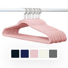 a pink plastic hanger with six different colors on it and the color swatches below