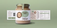 a jar of peanut butter sitting next to a label on a green background with information about the product