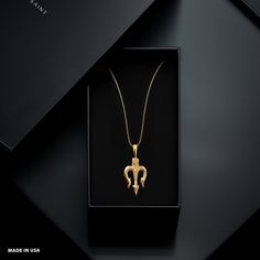 Elevate your style with our 14k Gold Trident Pendant. This solid gold necklace showcases exquisite craftsmanship, symbolizing power and strength. The 14 karat gold Trident pendant is more than just jewelry; it's a fine representation of mythology and symbolism, also available in 18k yellow gold. PENDANT INFORMATIONThis pendant is made of real, solid gold.• Made in USA• Material: 14k or 18k solid gold• Finish: polished• Height: 1.82" (46 mm) | *includes the small circle, bail dimensions not inclu Yellow Gold Symbolic Jewelry With Box Chain, Symbolic Yellow Gold Jewelry With Box Chain, Ceremonial Pendant Necklace With Polished Finish, Ceremonial Polished Pendant Necklaces, Ceremonial Polished Pendant Necklace, Symbolic Yellow Gold Box Chain Necklace, Trident Pendant, Solid Gold Necklace, Small Circle