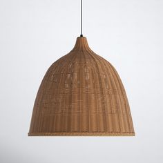 a wicker light fixture hanging from a ceiling