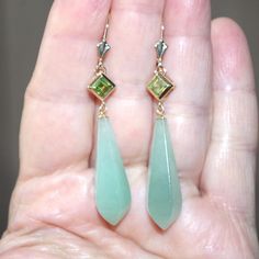 VINTAGE GORGEOUS GENUINE 14K TRANSLUCENT JADE TEAR DROP LEVER BACK EARRING WITH RADIANT CUT PERIDOTS These Unique Earrings are 55 MM including Leverbacks Length Of  Hexagan Carved Translucent Jade Drops  Only :  32 MM Diameter  Of  Jade   11 MM  AT WIDEST PART Large Size Earrings  Stylish  /   8.7    GRAMS /   43.5 CARATS Very Cool Looking. You Will Love Wearing It. Translucent Jewelry, August Birthday, Peridot Earrings, Jeweled Earrings, Leverback Earrings, Stylish Earring, Radiant Cut, Pearl Stud Earrings, Pearl Studs