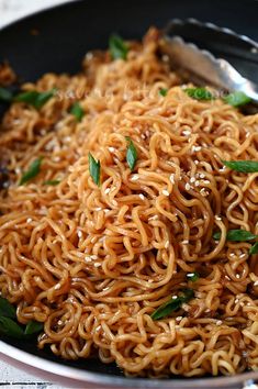 a close up of a bowl of noodles