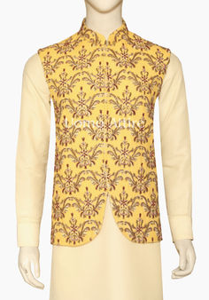 Yellow Mehndi Waistcoat Gold Cutdana Nehru Jacket For Festivals, Gold Nehru Jacket With Cutdana For Festivals, Bollywood Style Nehru Jacket With Gold Embroidery, Traditional Yellow Nehru Jacket For Festivals, Gold Bollywood Nehru Jacket For Transitional Season, Festive Gold Nehru Jacket With Cutdana, Gold Nehru Jacket For Designer Wear In Transitional Season, Gold Nehru Jacket For Designer Wear During Transitional Season, Gold Nehru Jacket With Zari Work For Festivals