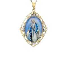 A beautiful and timeless statement of faith, this Virgin Mary pendant is crafted in Sterling Silver and 18 karat gold plating. The filigree oval frame, adorned with 12 crystals, takes this piece to the next level of elegance. The Hail Mary prayer is inscribed on the back of the pendant. The pendant hangs on an 18-inch rope chain with spring ring clasp. Color: Blue. Gender: female. Age Group: adult. Elegant Miraculous Medal Necklace, Elegant Oval Necklace With Miraculous Medal, Elegant Round Miraculous Medal Jewelry, Elegant Miraculous Medal Jewelry For Gift, Elegant Miraculous Medal Jewelry Gift, Elegant Miraculous Medal Jewelry, Elegant Pendant Necklace With Miraculous Medal, Elegant Miraculous Medal Round Pendant Jewelry, Elegant Oval Miraculous Medal Jewelry