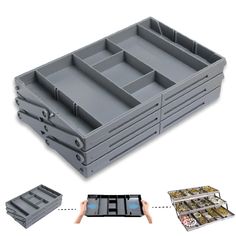 a large gray plastic container with compartments and dividers on the side, next to four smaller trays