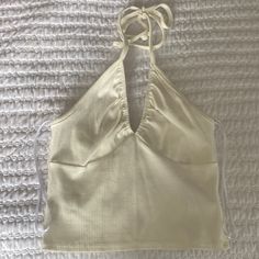 New With Tags. Urban Outfitters Ivory Halter Top. Size Xs Chic White V-neck Halter Top, White Casual Halter Neck Tank Top, Casual White Halter Neck Tank Top, White Halter Neck Tank Top, Beige Halter Neck Top, White Cotton Halter Neck Tank Top, Solid Color Cotton Halter Neck Tops, White Fitted Halter Neck Crop Top, White Fitted Halter Neck Top