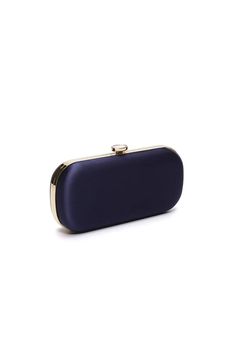 Introducing the Bella Clutch Navy Petite: the quintessence of style and practicality in a smaller format. This custom designer clutch, ideal as an exquisite wedding handbag, captures the essence of timeless elegance. Crafted from luxurious duchess satin, its navy hue serves as your sophisticated 'something blue' for an evening ceremony. Size Petite: 8" x 4" x 2" Details: Italian Duchess Satin, hardshell metal frame, fabric interior with pocket, top clasp closure Whether you're celebrating by the Wedding Handbag, Bridal Purse, Designer Clutch, Duchess Satin, Evening Wedding, Blue Satin, Something Blue, Elegant Wedding, Metal Frame