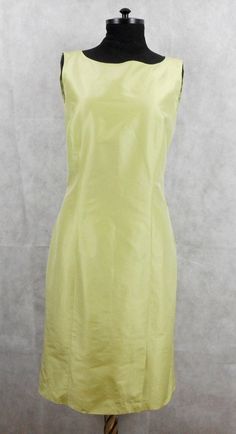 Elegant dress by Etro, sleeveless plain model with small slits in the front and rear, zip to the left,in pale green color, full lining. Made of 76% cotton, 24% silk, lining - 100% silk, made in Italy, size 42 Very well preserved Measurements taken flat: Length 99 cm / 39'' Shoulder width 35 cm / 13.7'' Waist 39 cm / 15.4'' Hips 47 cm / 18.5'' Light Green Fitted Sleeveless Dress, Fitted Light Green Sleeveless Dress, Fitted Sleeveless Light Green Dress, Formal Green Sleeveless Dress For Summer, Green Sleeveless Dress For Formal Summer Occasions, Green Sleeveless Dress For Formal Summer Events, Summer Green Sleeveless Dress For Formal Events, Elegant Sleeveless Light Green Dress, Spring Formal Sleeveless Dress With Back Zipper