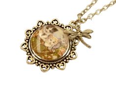 This cute necklace is a lovely gift idea for cat fans. The pendant consists of a flower-shaped setting and a hand-crafted glass cabochon that shows a motif with three kittens. There is also a dragonfly charm above the pendant. The pendant measures 3.6 L x 3.2 W cm. The chain is 45 cm long and can be extended to 50 cm. Whimsical Metal Jewelry For Gifts, Cute Flower Pendant Jewelry Gift, Cute Flower Pendant Jewelry For Gifts, Metal Cat Design Necklace For Gift, Cute Nickel-free Round Necklaces, Mother's Day Jewelry With Cat Design For Gift, Cute Cat Design Round Jewelry, Cute Cat Design Jewelry, Cute Round Cat Design Jewelry