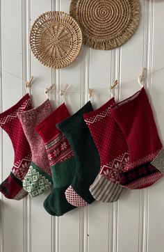 five pairs of socks hanging on the wall