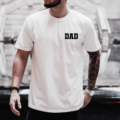 Celebrate the special men in your life with our customizable Dad T-shirt for men! Our premium quality tee features a classic Dad design that can be personalized with your own text and color choices. Whether you're honoring your father, grandfather, or any other father figure, this shirt makes the perfect Father's Day gift or birthday present.  Please make sure to select the correct item from the dropdown (sleeve length). Some thumbnails/pictures are sweatshirts, T-shirts, etc, but we have multip Short Sleeve T-shirt For Father's Day Streetwear, Father's Day White T-shirt With Custom Print, Cotton T-shirt For Father's Day, Father's Day Graphic Tee With Custom Print, Father's Day Custom Print Graphic Tee, White Crew Neck Top For Father's Day, Custom Print T-shirt For Father's Day, Father's Day Graphic Tee With Relaxed Fit, Customizable Father's Day Crew Neck T-shirt