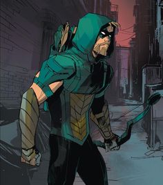 a man in a green hoodie holding a bow and arrow on the side of a street