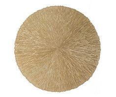 a large round piece of straw on a white background