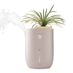 Dry indoor air can lead to static electricity, thirsty houseplants, and even dry skin—making breathing and sleeping conditions uncomfortable. The Homedics Natura Ultrasonic Warm & Cool Mist Humidifier combats dryness with a nozzle that converts water into a fine warm or cool mist, evenly releasing the perfect amount of moisture for spaces up to 402 sq. ft.* This sleek, modern humidifier, consciously crafted with recycled materials, not only enhances your decor but also includes a programmable di Modern Humidifier, Humidifier For Plants, Plant Humidifier, Waterless Diffuser, Paraffin Bath, Baby Sound Machine, Percussion Massager, Mist Humidifier, Crafts From Recycled Materials