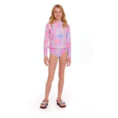 Get ready to make a splash in style with our vibrant Pink Tie Dye Rashguard for girls! This must-have swimwear piece features a trendy tie dye design that will make your little one stand out at the pool or beach. Made with high-quality fabric, it offers both comfort and sun protection, perfect for all-day play. Don't miss out on this fun and fashionable addition to your child's summer wardrobe! Playful Fitted Tankini With Uv Protection, Playful Stretch Swimwear With Uv Protection, Playful Spring Tankini With Uv Protection, Playful Fitted Swimwear With Uv Protection, Spring Beachwear Rash Guard For Pool, Casual Summer Rash Guard For Playwear, Casual Rash Guard For Pool In Summer, Casual Summer Rash Guard For Pool, Playful Summer Rash Guard With Uv Protection